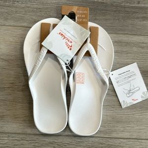 Archies, never worn white flip flops.